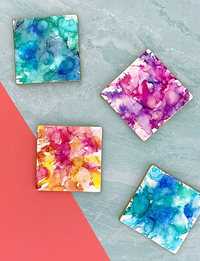 colorful alcohol ink on tile